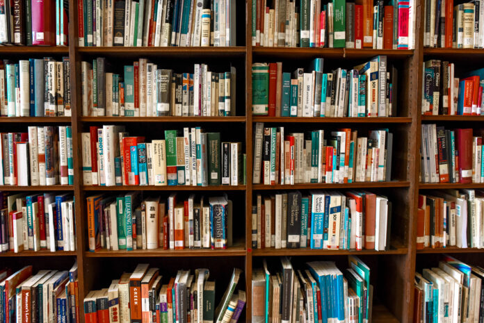 Image of stuffed library shelves.